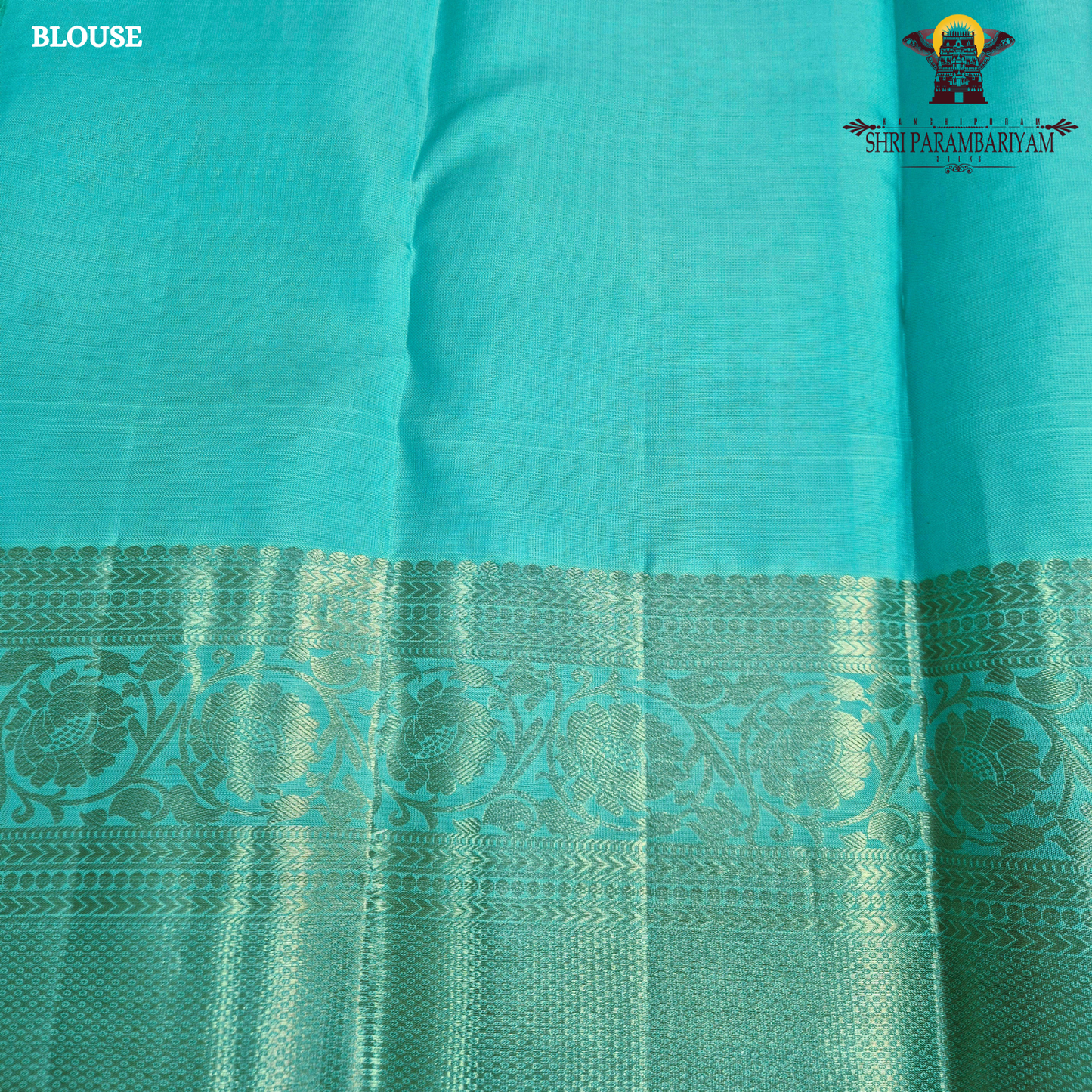 Elegant sea green / aqua blue shade with silver zari work and a subtle peach Saree