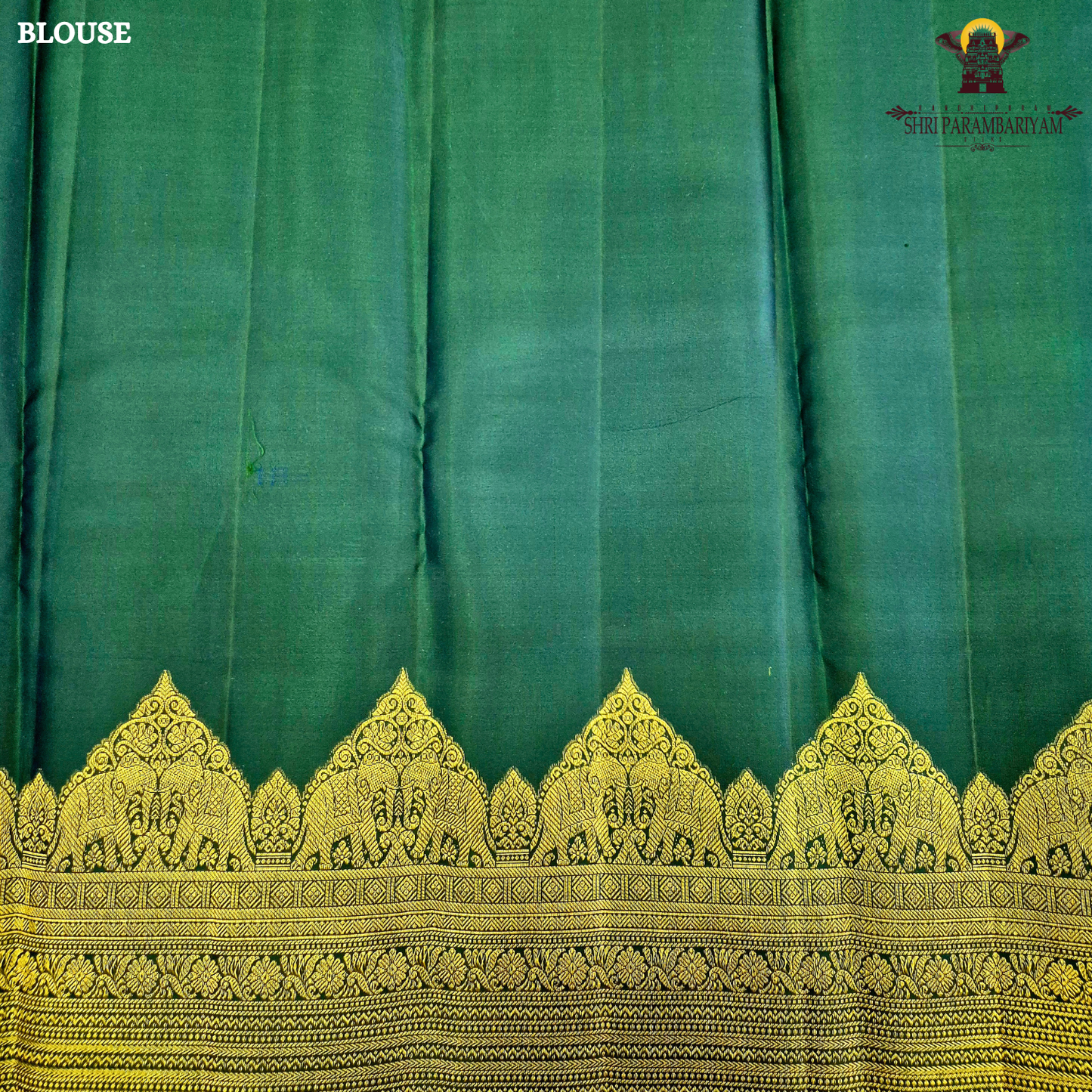 A classic Deep Green body adorned with finely woven gold zari Saree