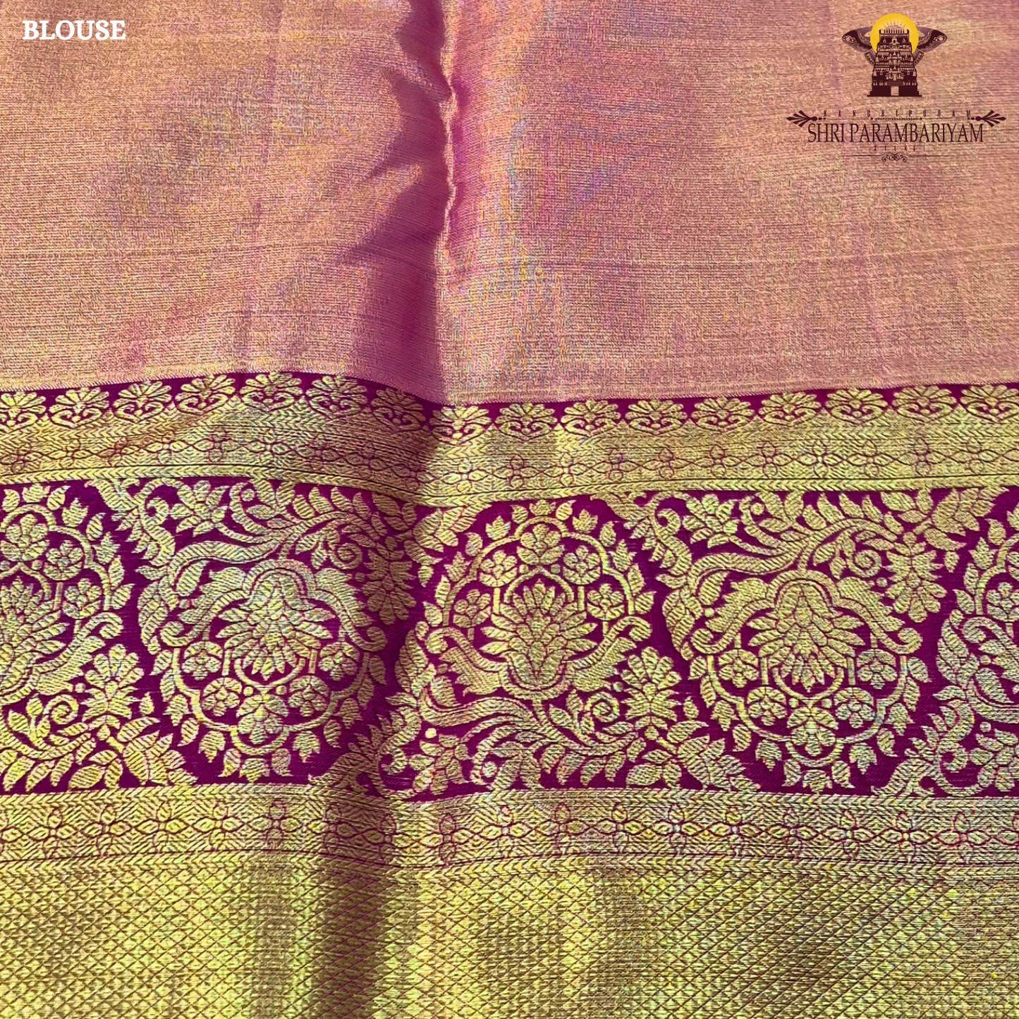 A soft peach tissue body paired with a rich magenta border Saree