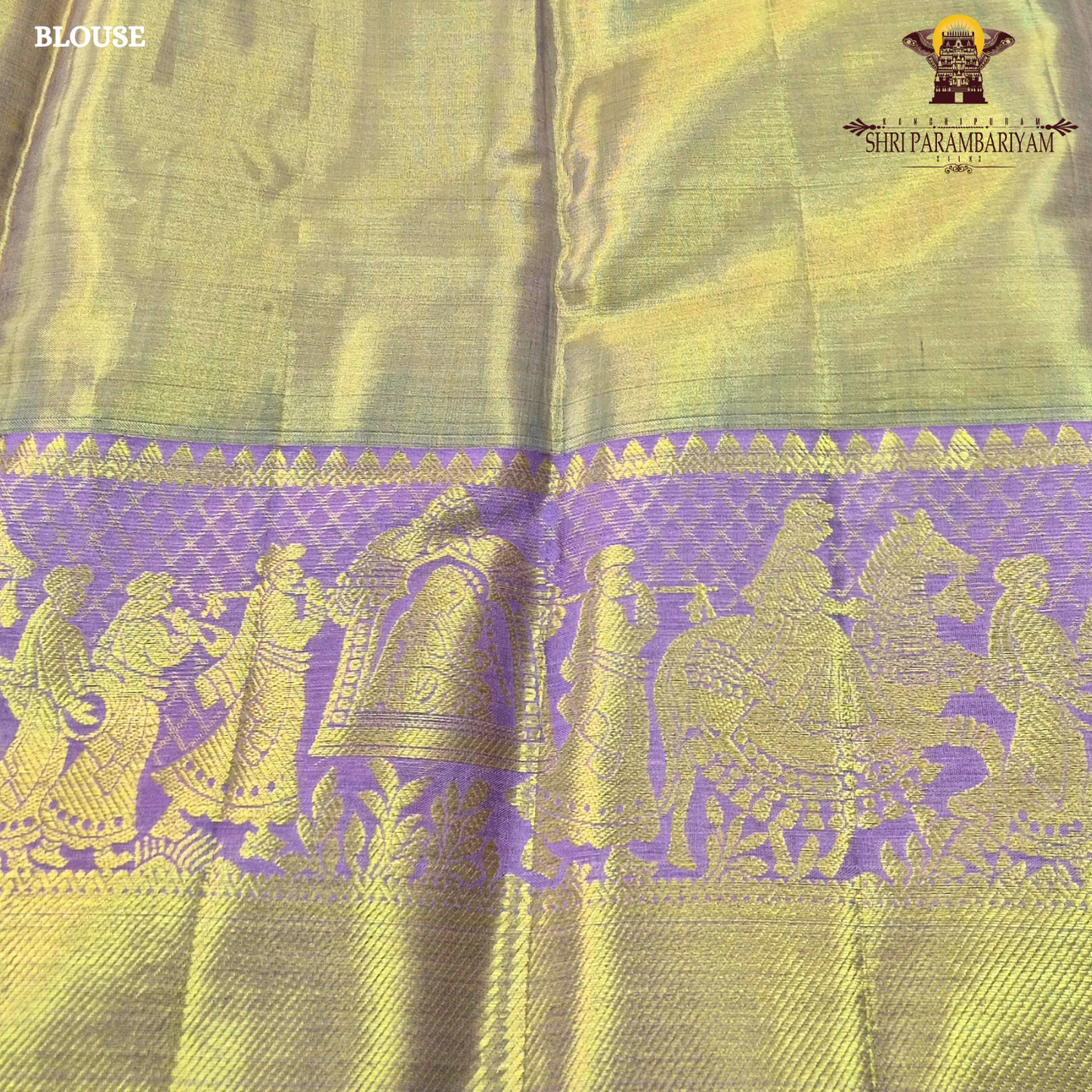 A charming lavender / lilac base paired with a rich golden zari pallu Saree