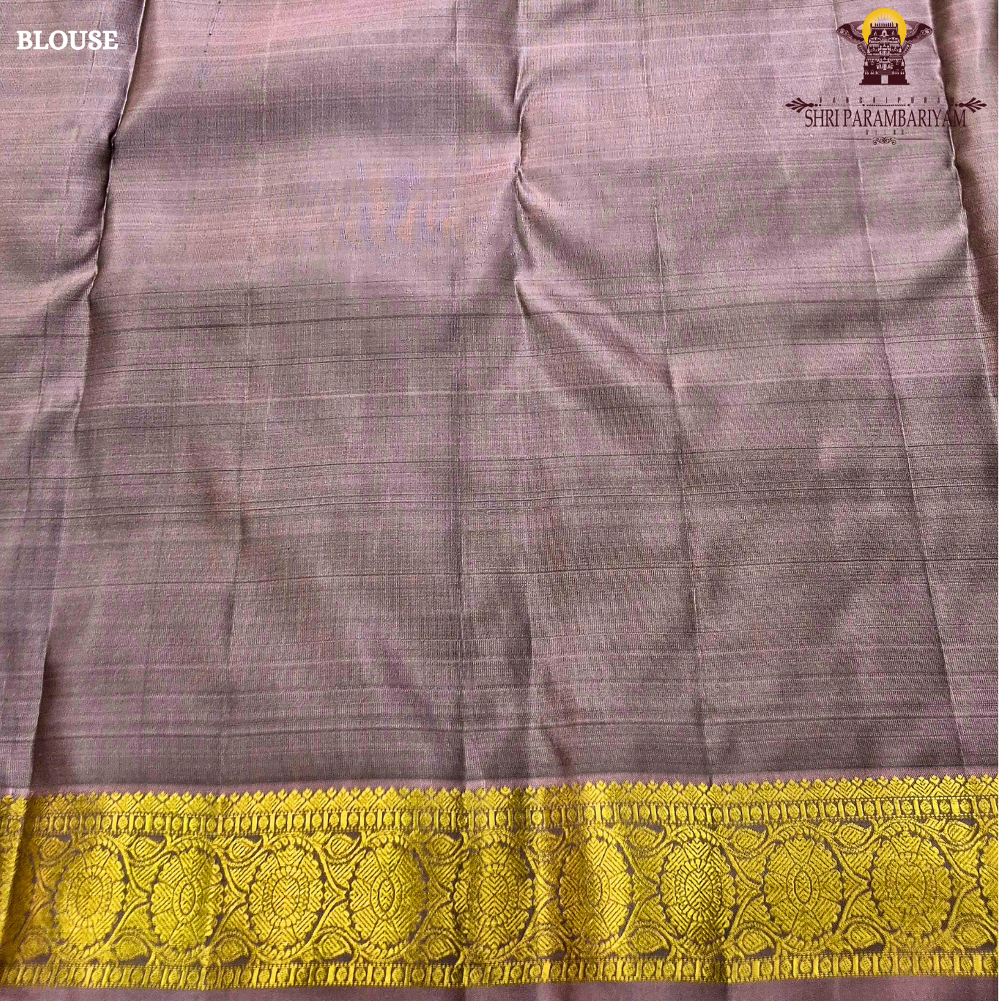 Elegant Dusty Green / Sage Green body with rich gold zari buttas, paired with a mustard gold zari 2-inch traditional border and subtle mauve selvedge edging Saree