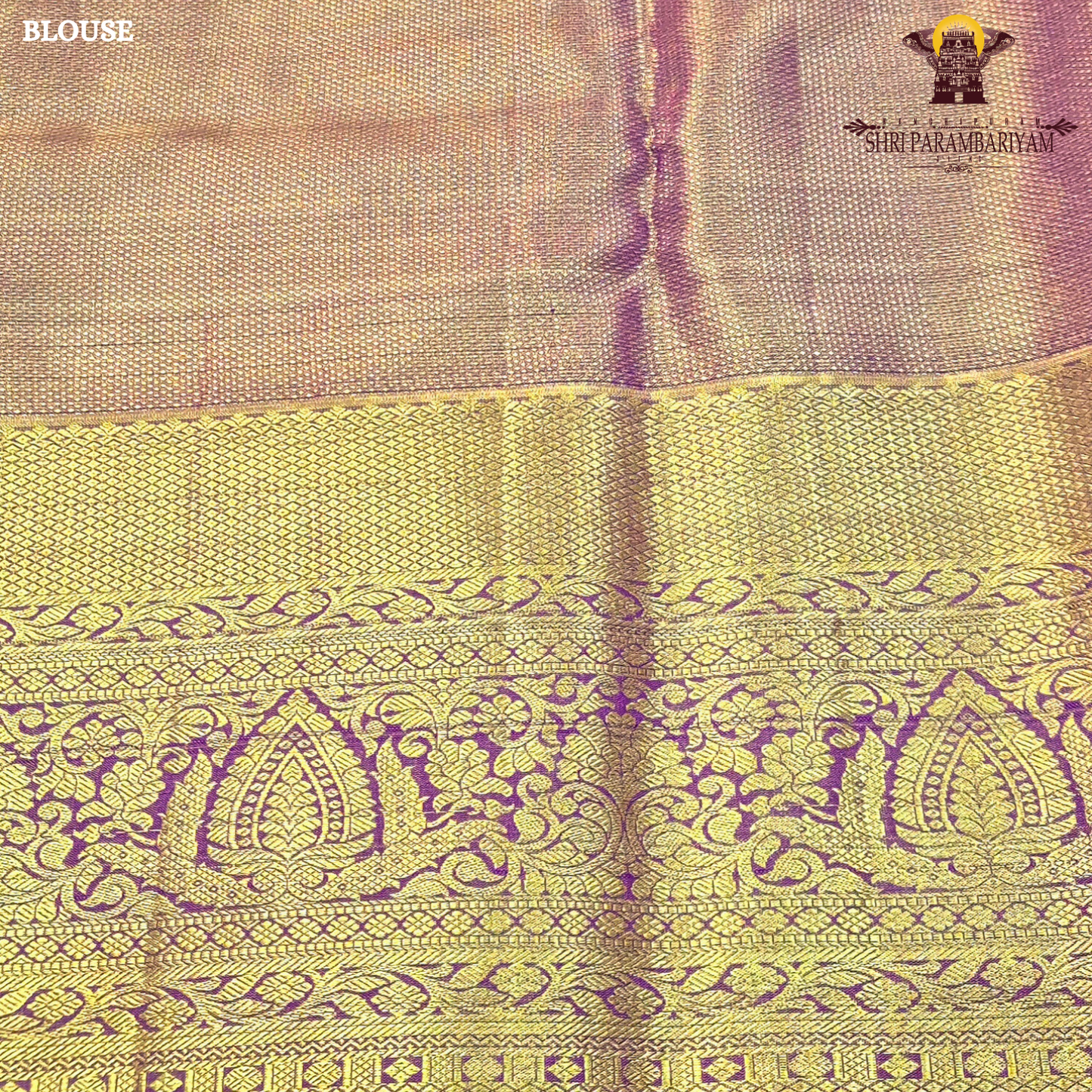 Rich antique gold with deep magenta / purple accents Saree