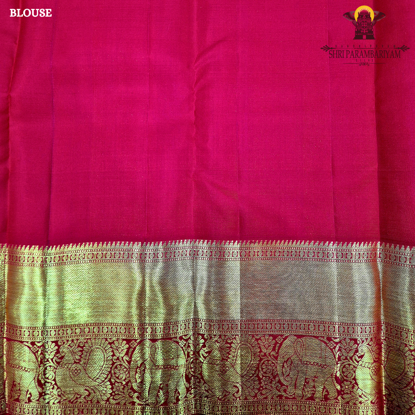 A bright rani pink with a rich red border Saree
