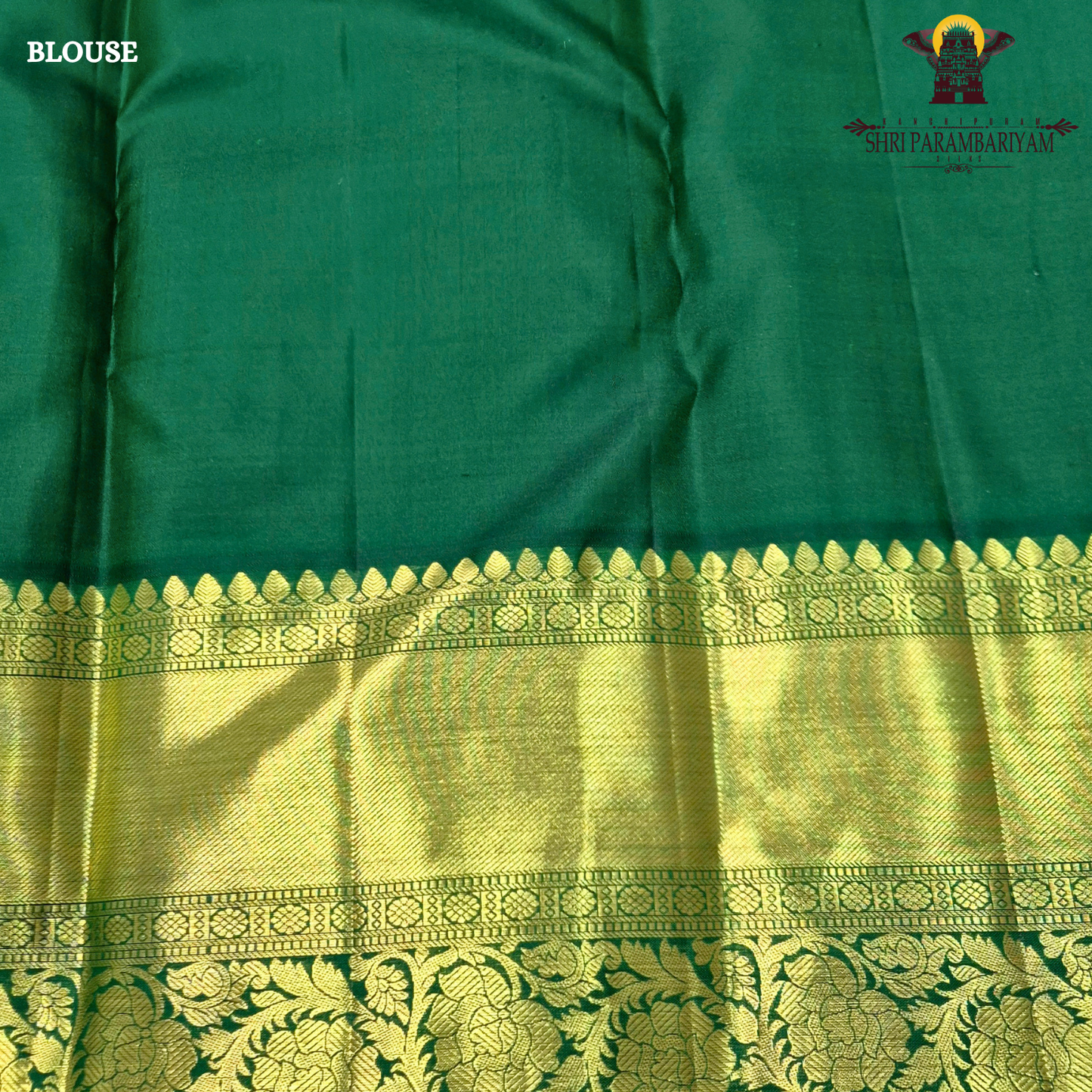 Soft half white (ivory/off-white) body with bottle green contrast border Saree