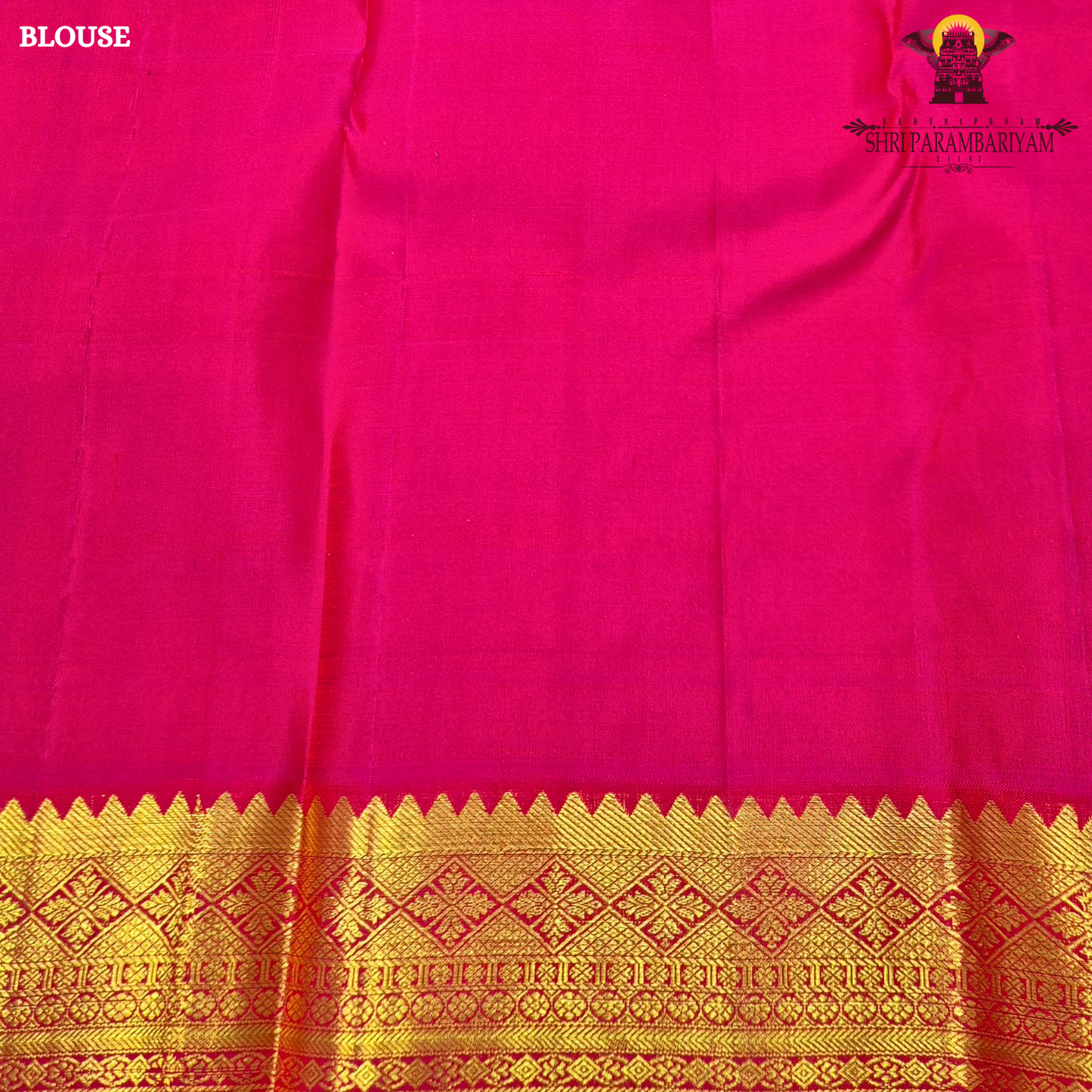 A classic tri-tone rusty maroon, royal purple, and deep pink (rani) Saree