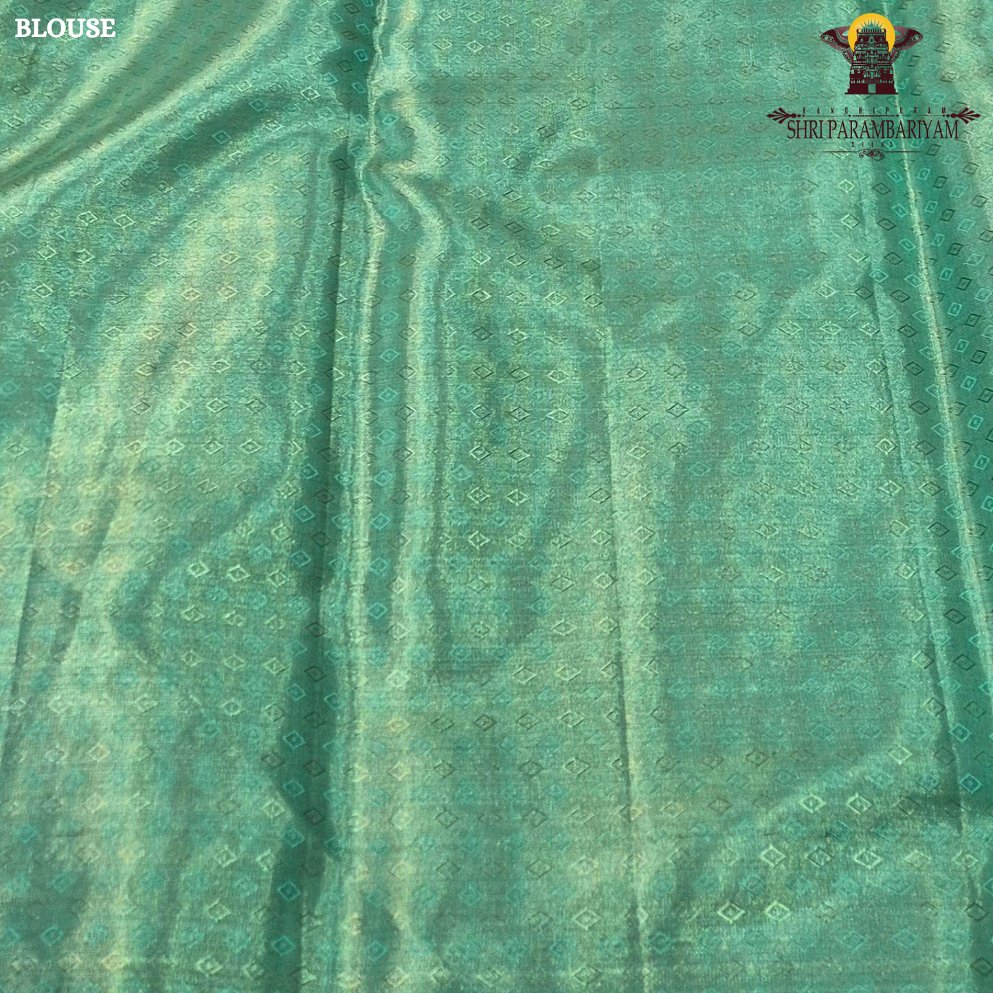 Soft pastel lavender-pink base with contrasting Saree