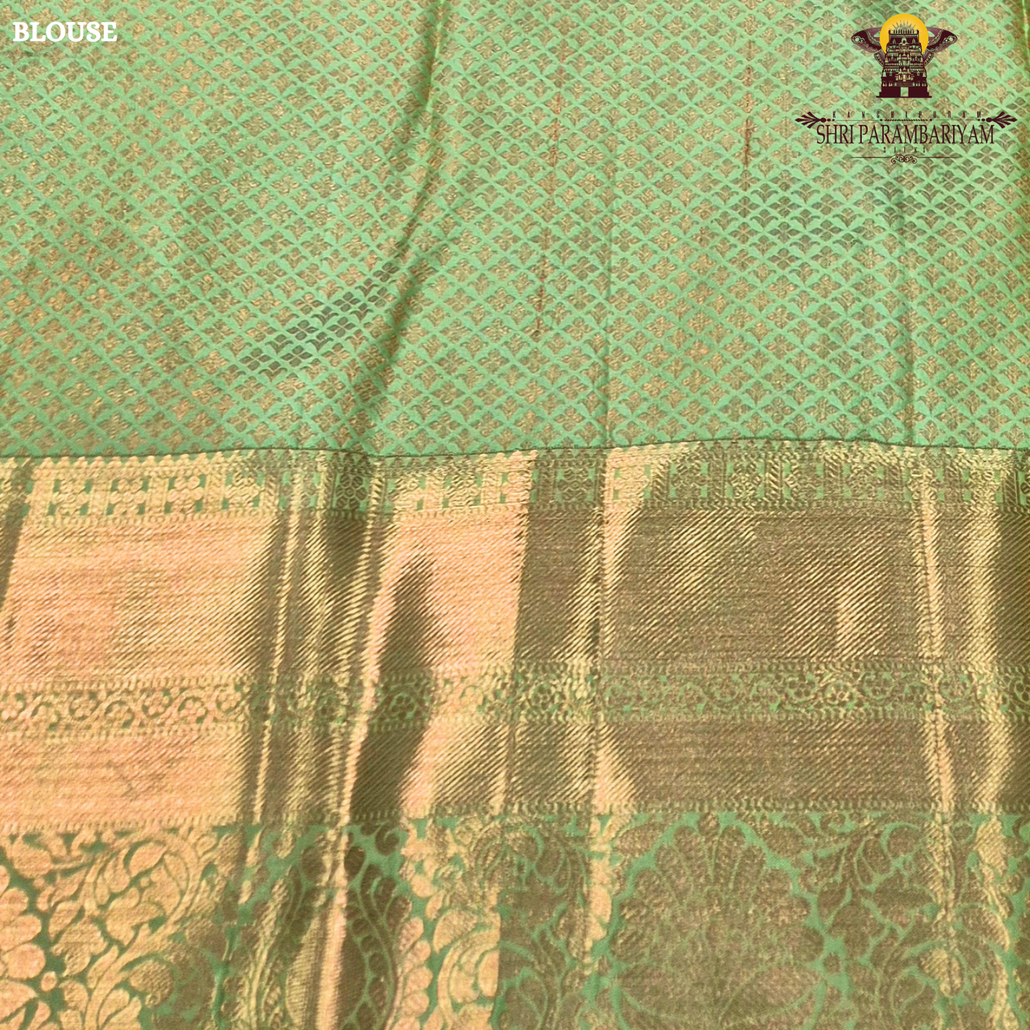 A soft rose pink body, paired with a refreshing parrot green korvai border Saree