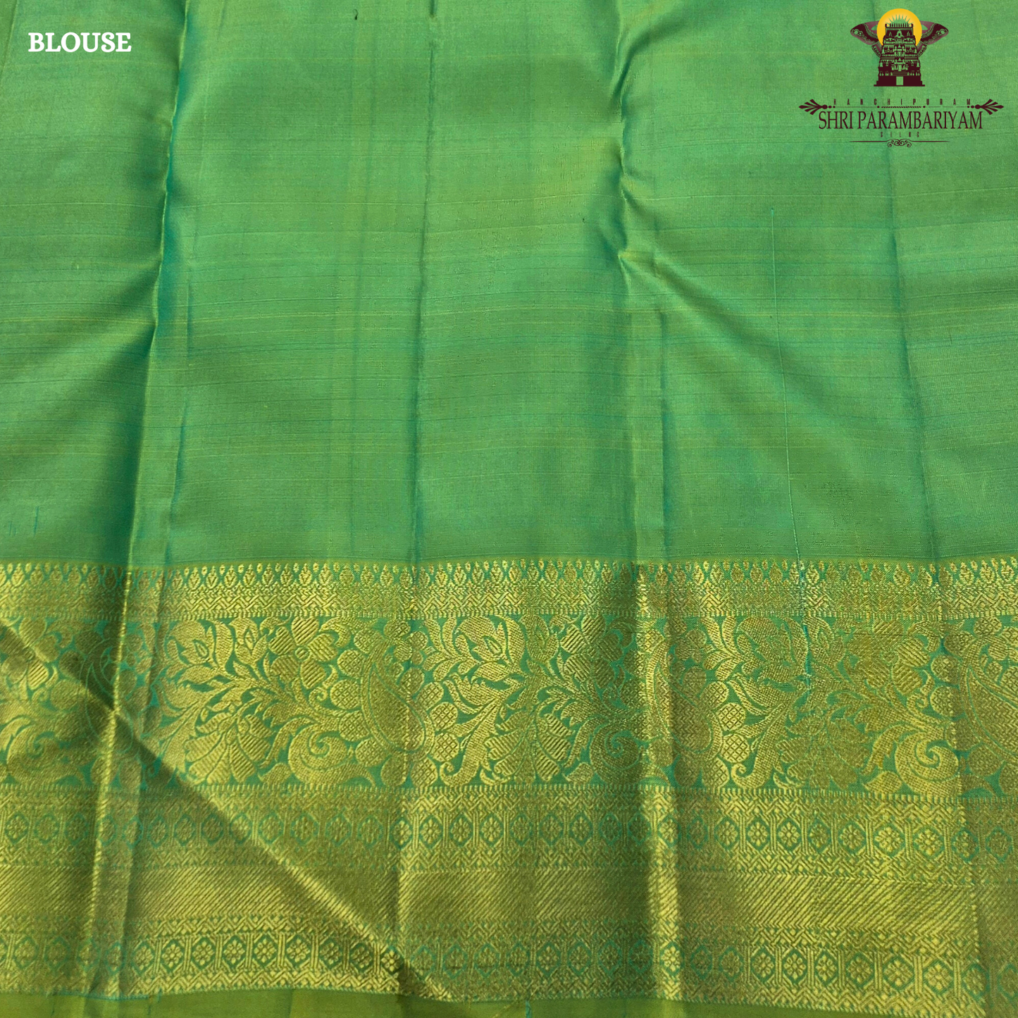 Elegant teal blue (peacock blue tone) with a rich contrast of gold zari and parrot green border Saree