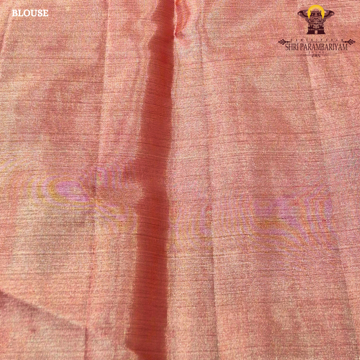 A beautiful peach gold shade blended with a soft pink undertone Saree
