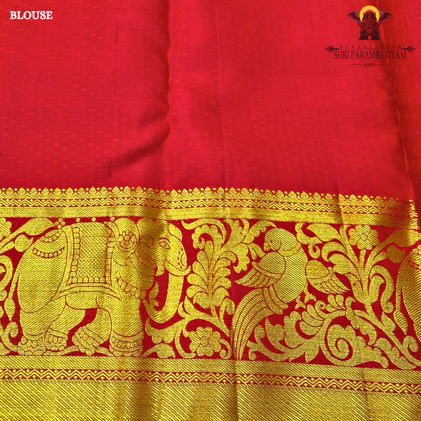 Rich bridal red base with Accentuated with bright gold zari work Saree