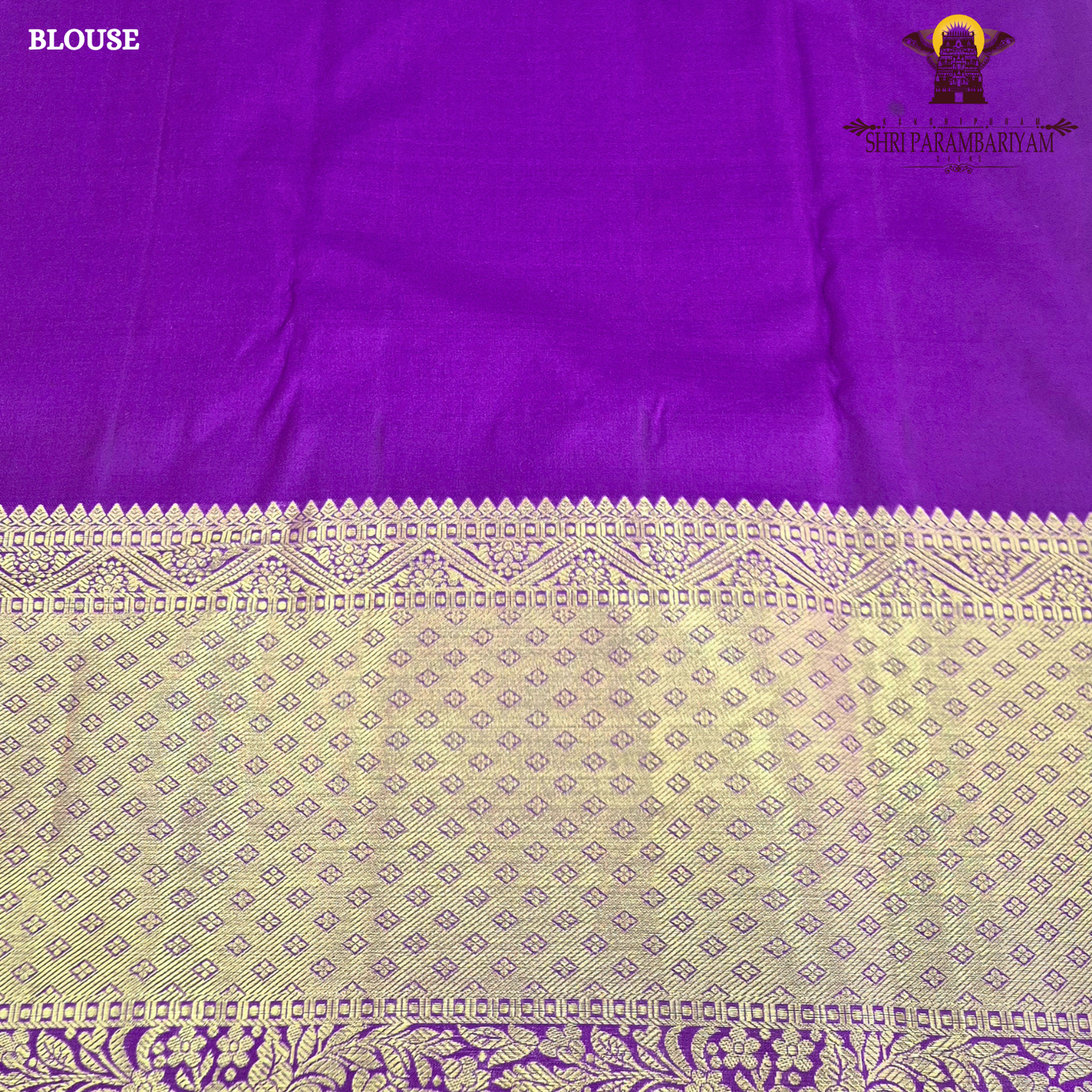 A rich cream/ivory base with a contrasting royal purple border Saree