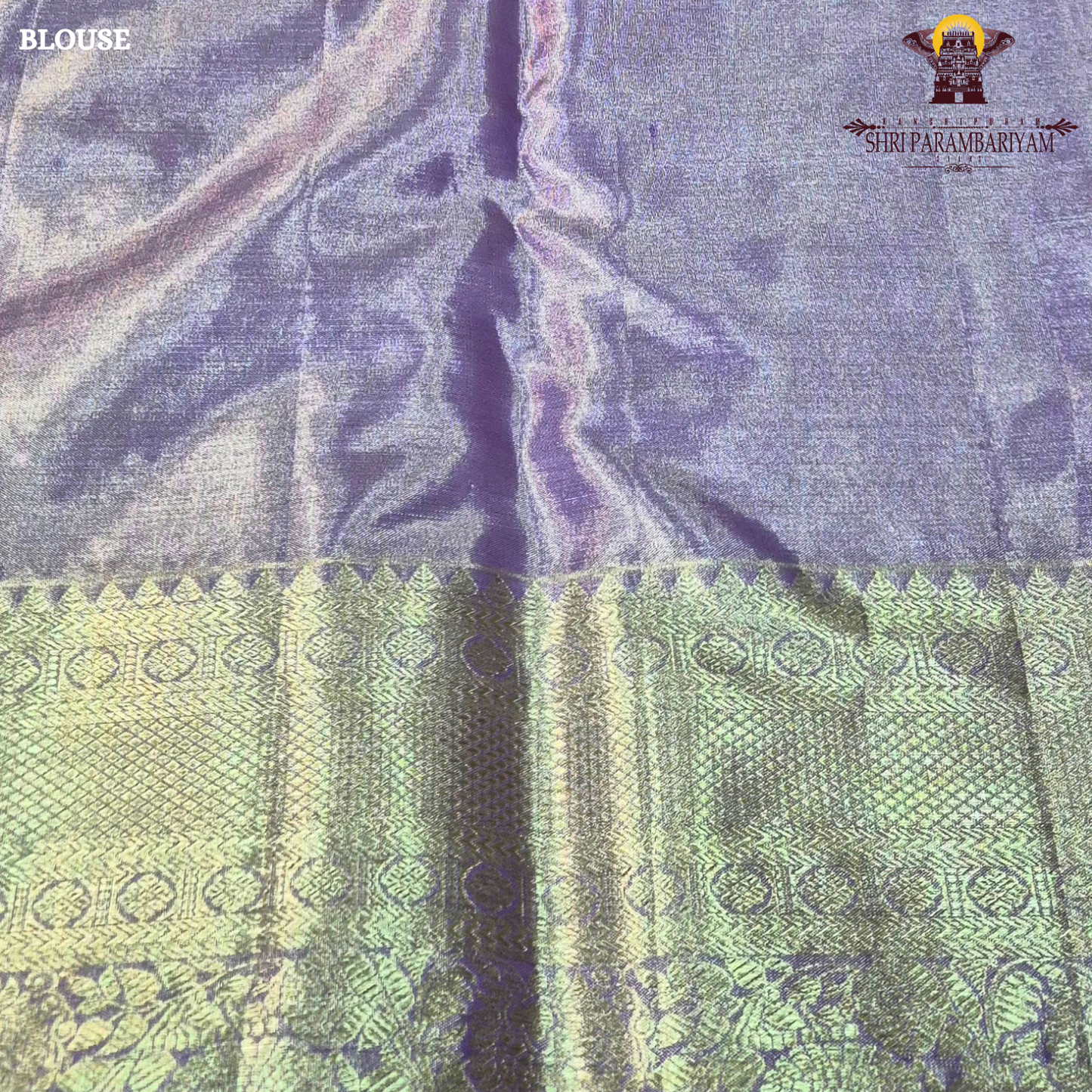 A graceful blend of lavender purple and soft silver tissue base Saree