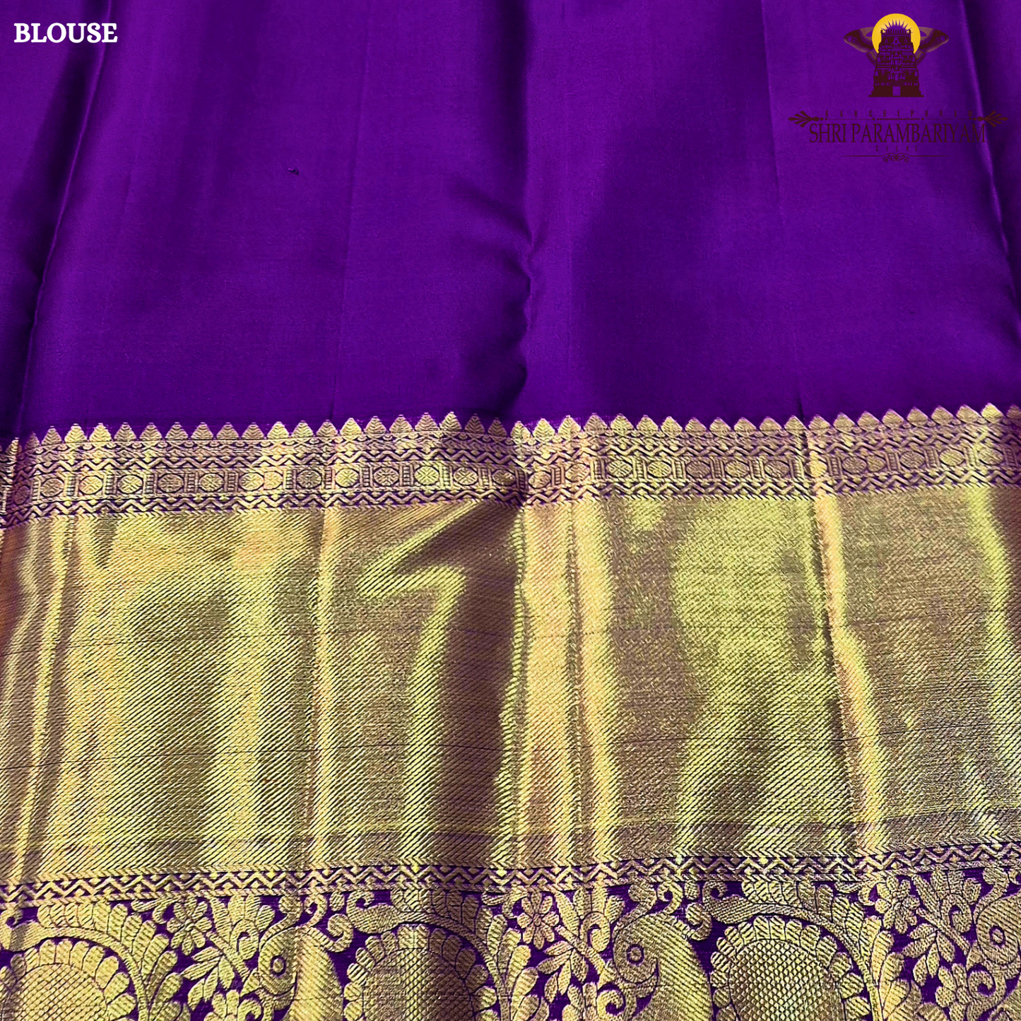 A soft peach pink body paired with a rich royal purple korvai border Saree