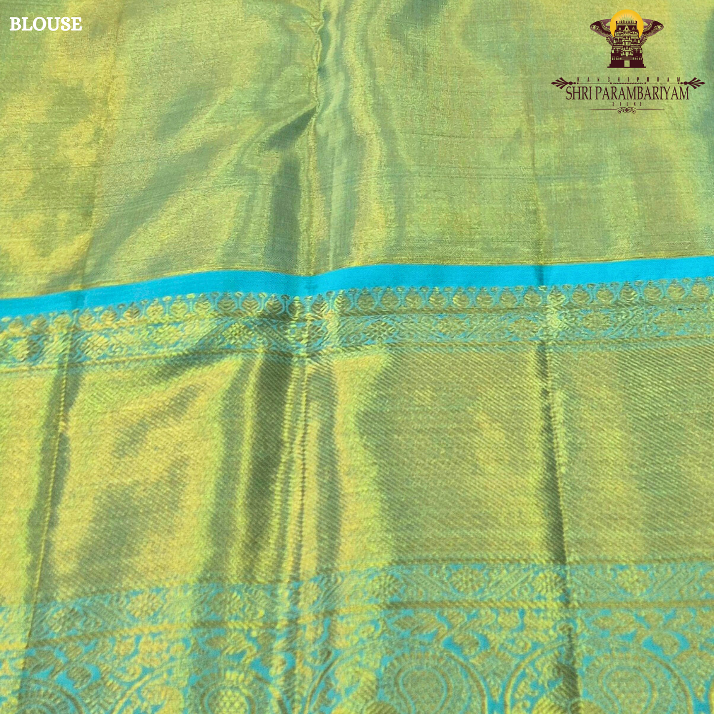A soft peach / blush pink body paired with a contrasting aqua blue border Saree