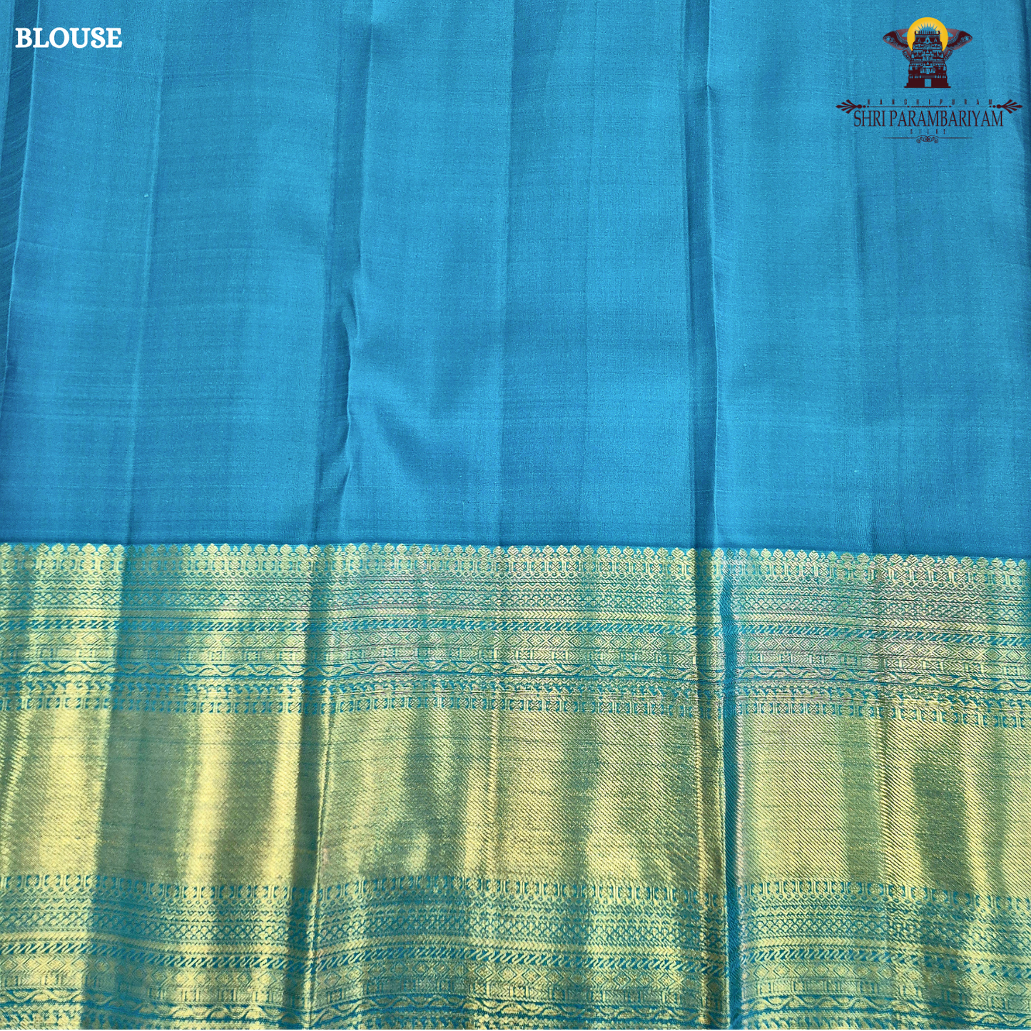 A elegant Peacock Blue (a vibrant blend of teal blue with a hint of turquoise) Saree