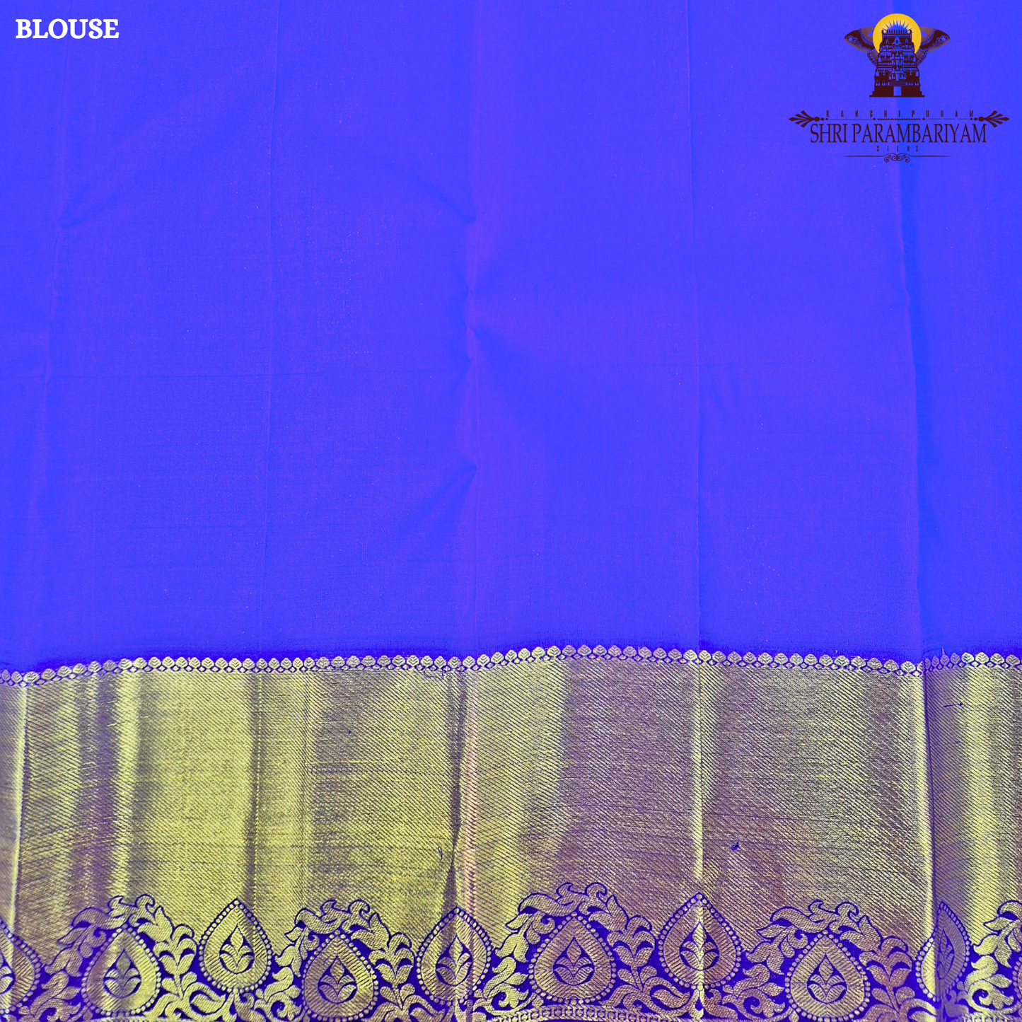 A rich Bright mango orange body with a rich gold zari Saree