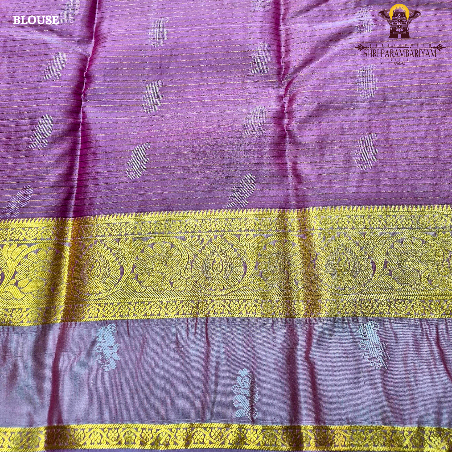 Rich magenta pink body with light pastel pink contrast pallu and antique gold zari Saree