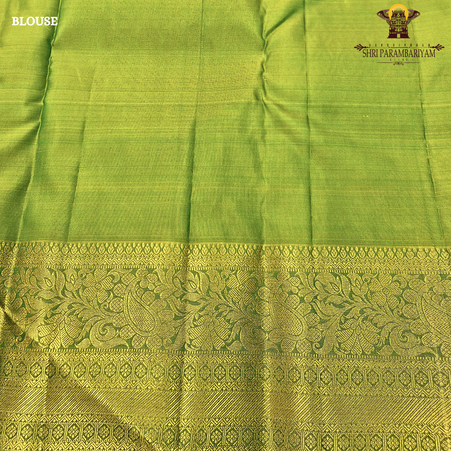 Rich bottle green with a contrasting antique gold zari border featuring a subtle olive-green tone Saree