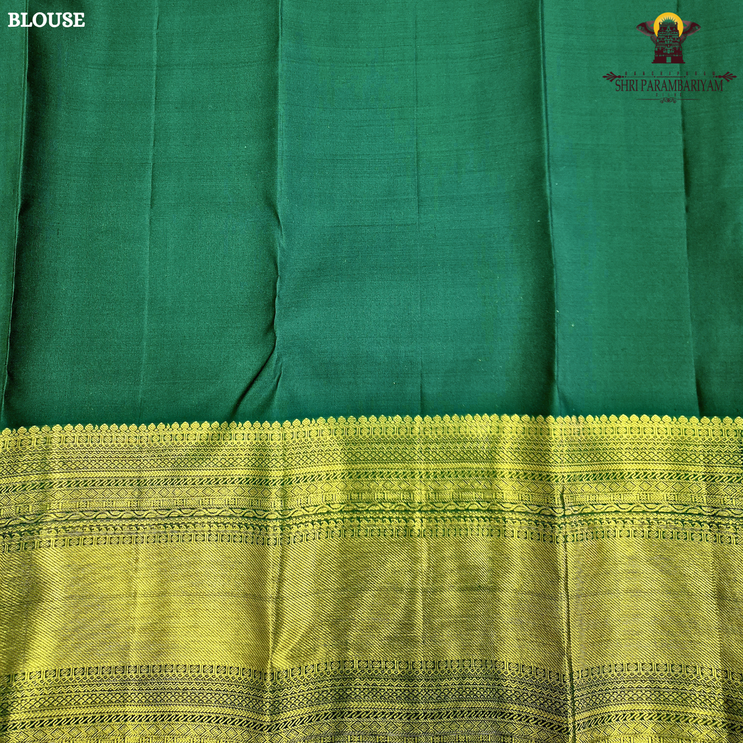 A captivating Deep Bottle Green / Dark Teal Green shade, beautifully complemented Saree