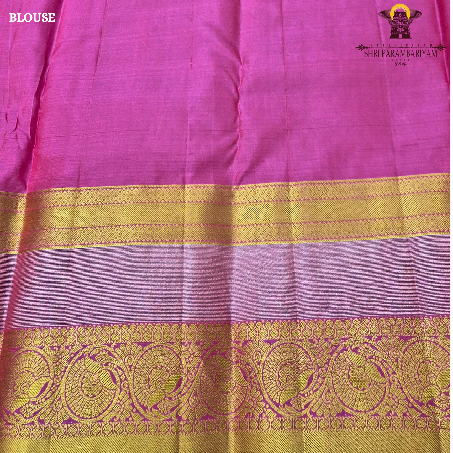 A vibrant reddish pink (vermilion red) body beautifully complemented Saree
