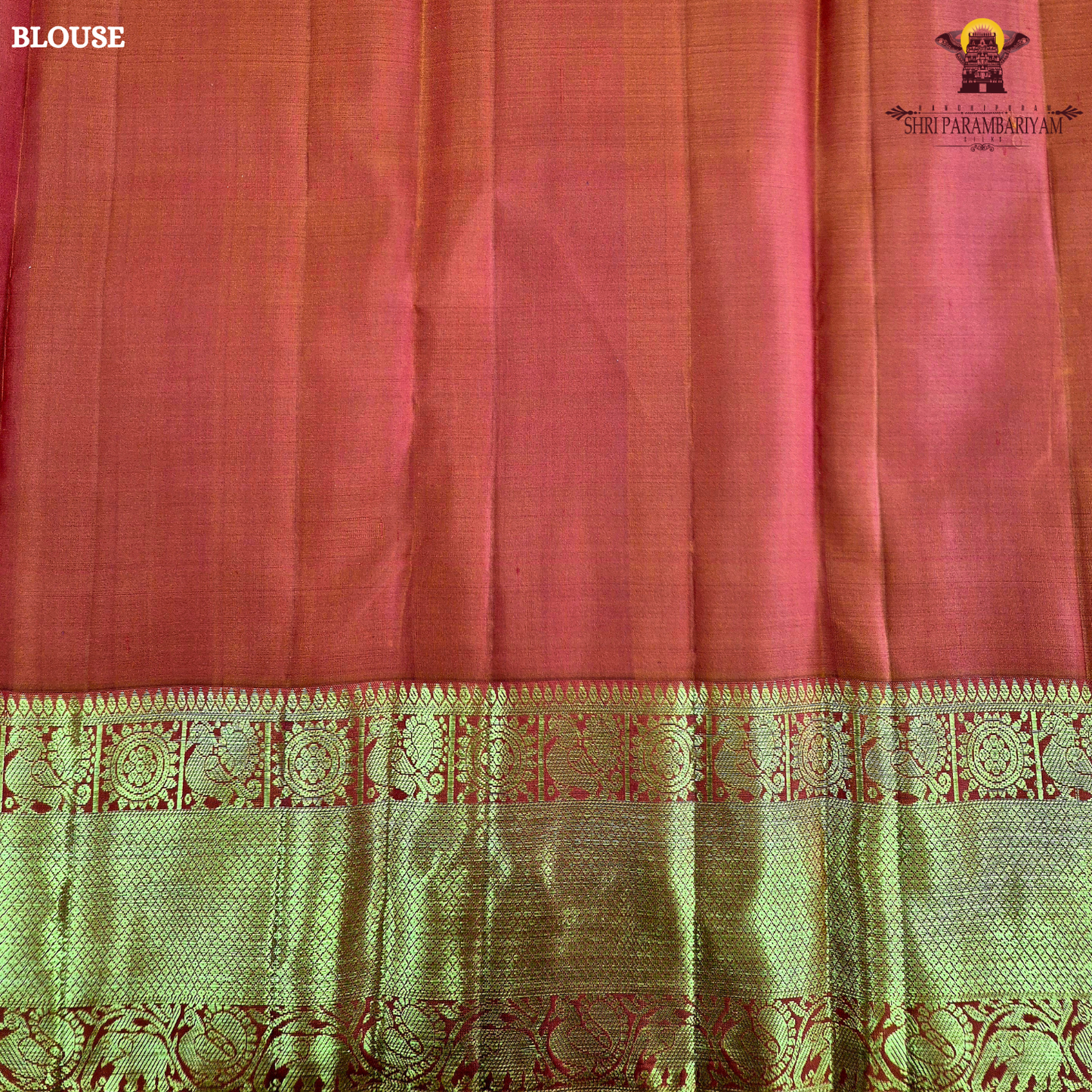 A radiant Vermilion Orange shade, beautifully highlighted with an exquisite gold zari Saree