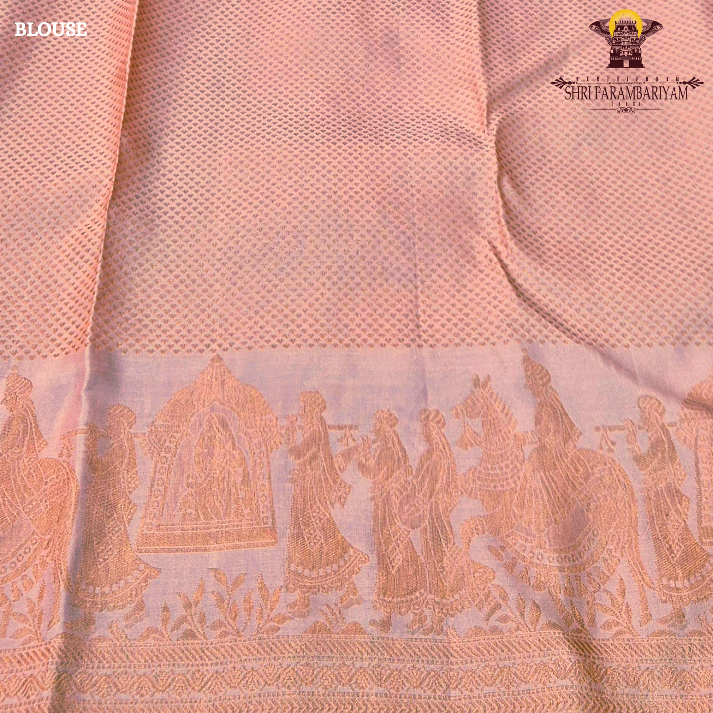 A soft peachy rose (muted bridal pink) shade with a warm undertone—an elegant Saree