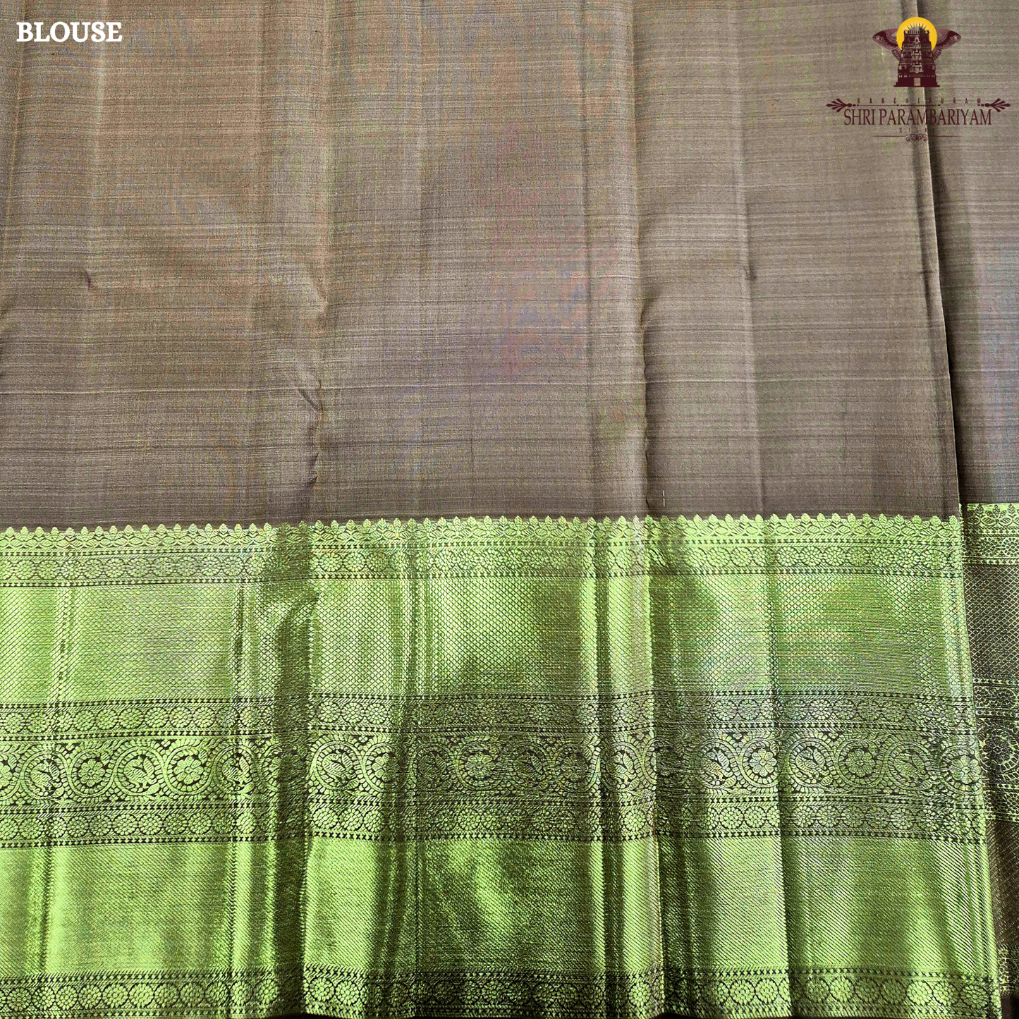 A sophisticated Antique Copper Brown / Golden Tan shade, beautifully enhanced with rich gold zari Saree