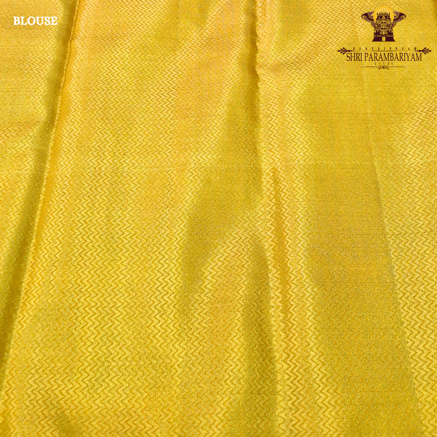 A rich mustard yellow (golden yellow) shade with a subtle shimmering Saree