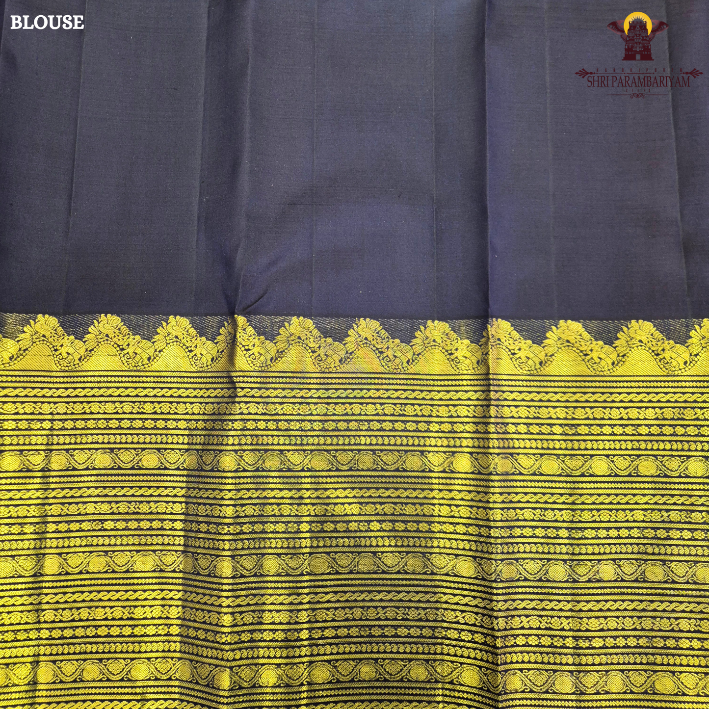 A rich deep navy blue body embellished with elegant gold zari Saree