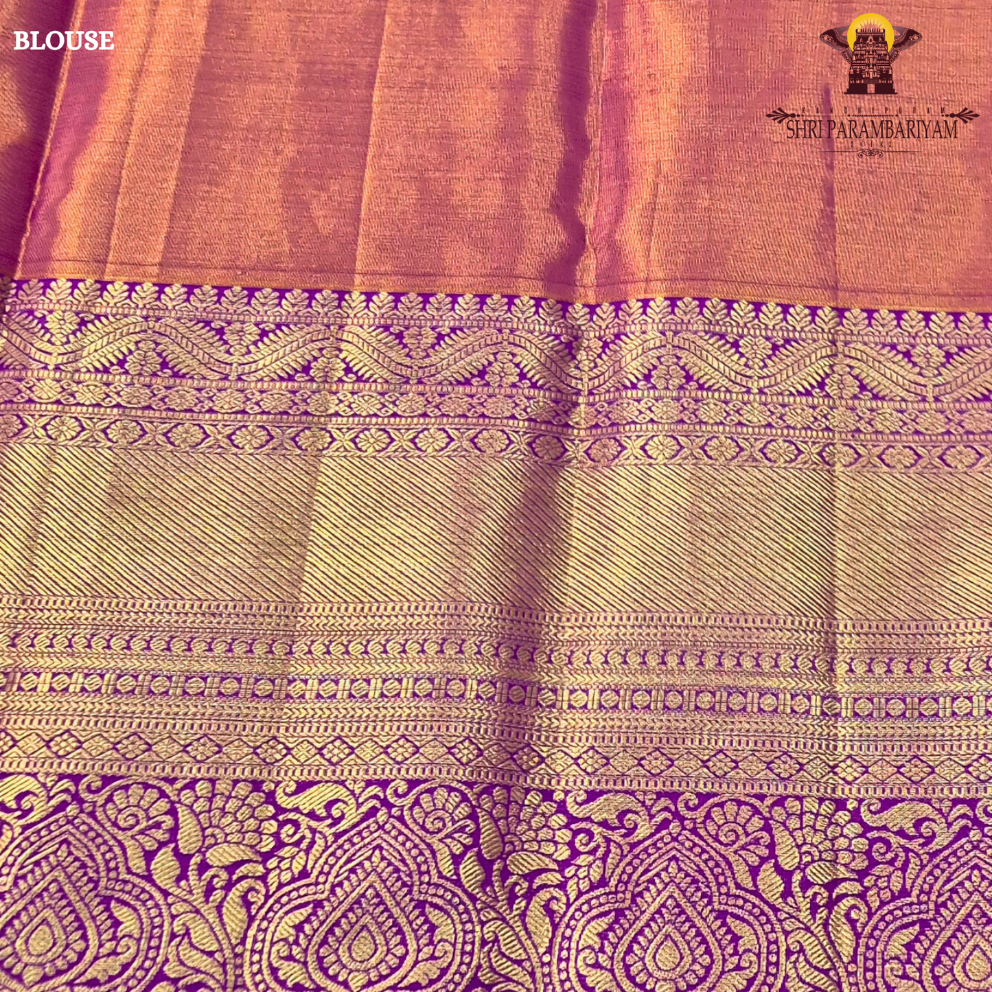 A radiant teal green tissue body paired with a rich royal purple border Saree