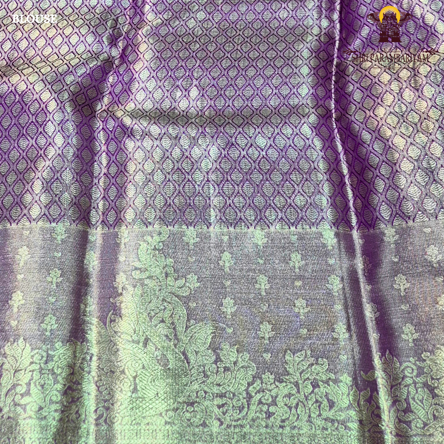A beautiful lavender purple shade enhanced with a shimmering silver tissue finish Saree