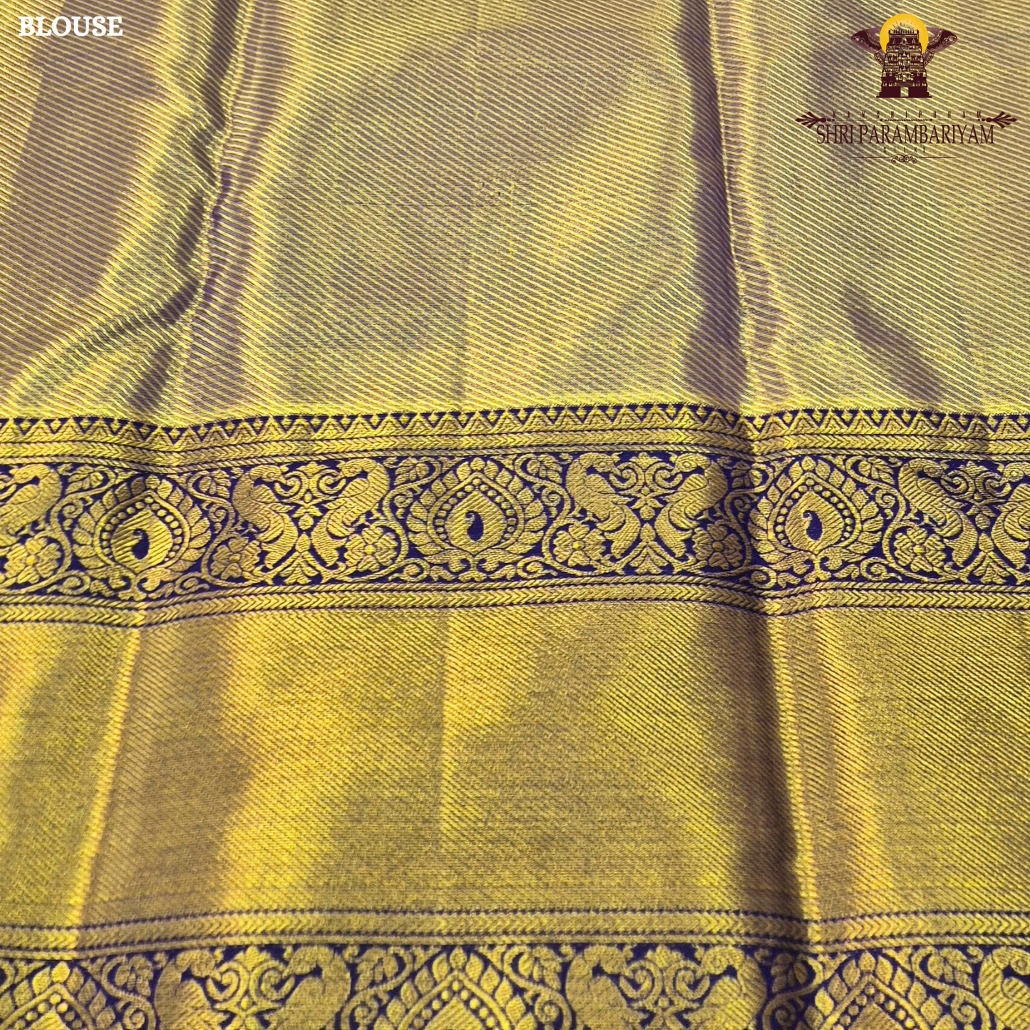 A soft and elegant peach / pastel rose gold body paired with a rich royal blue (navy blue) border Saree