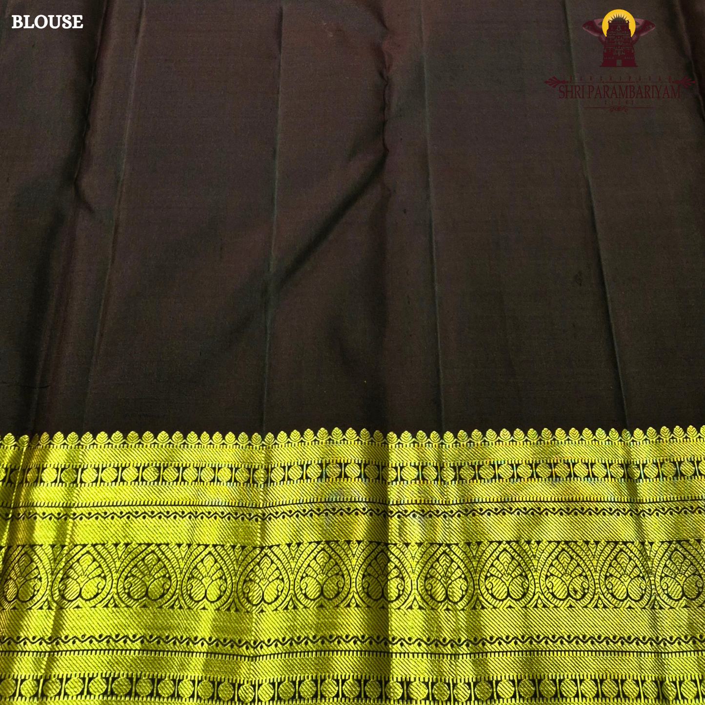A rich Parrot Green (fresh leaf green tone) with a rich Gold zari Saree