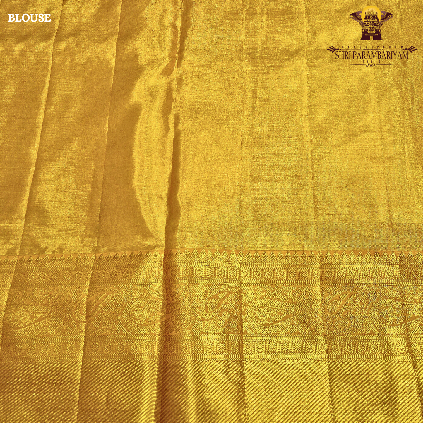 A rich antique gold shade that radiates elegance and traditional charm Saree