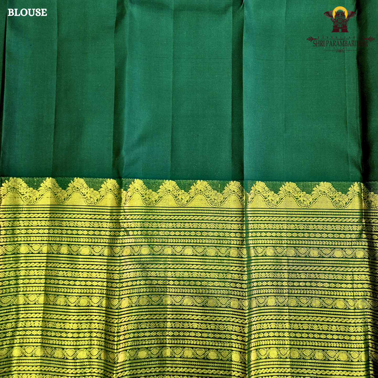 A deep Bottle Green with luxurious gold zari weaving Saree