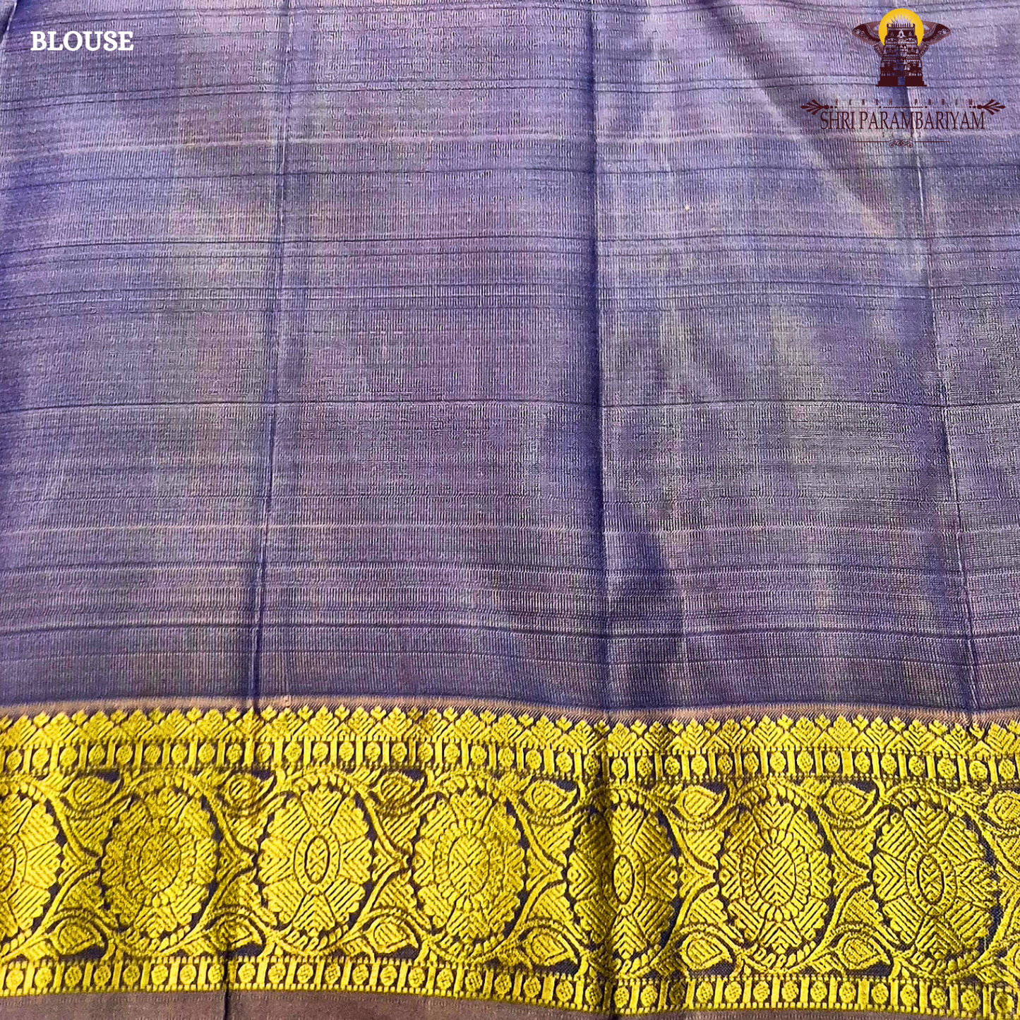 Teal Blue body with Gold zari 2-inch border and contrast Lavender-Purple edge Saree