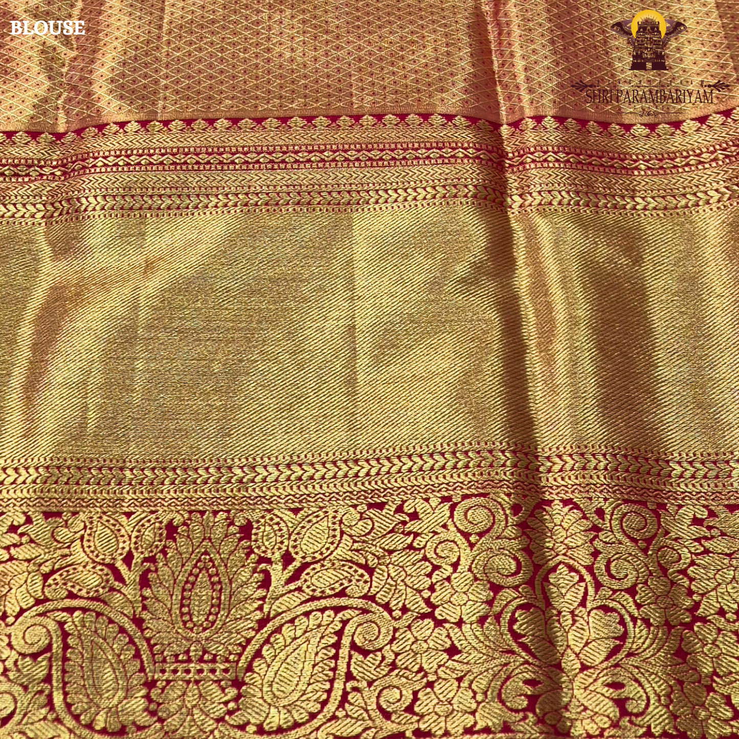 A refreshing lime green body paired with a rich golden tissue pallu and red zari border Saree