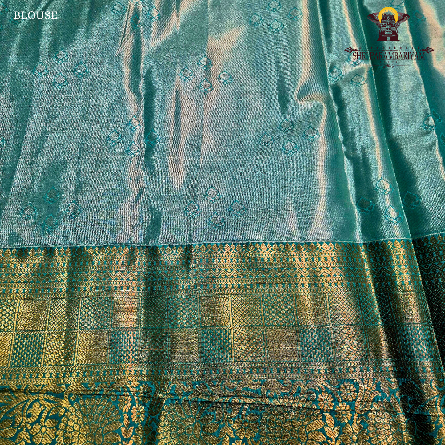 An elegant steel blue / peacock blue Tissue Saree