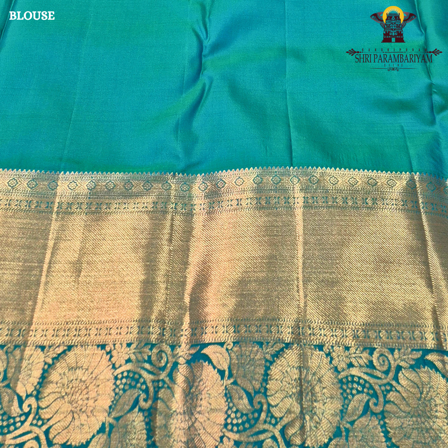 A Royal purple with a teal green border accent and rich gold zari Saree