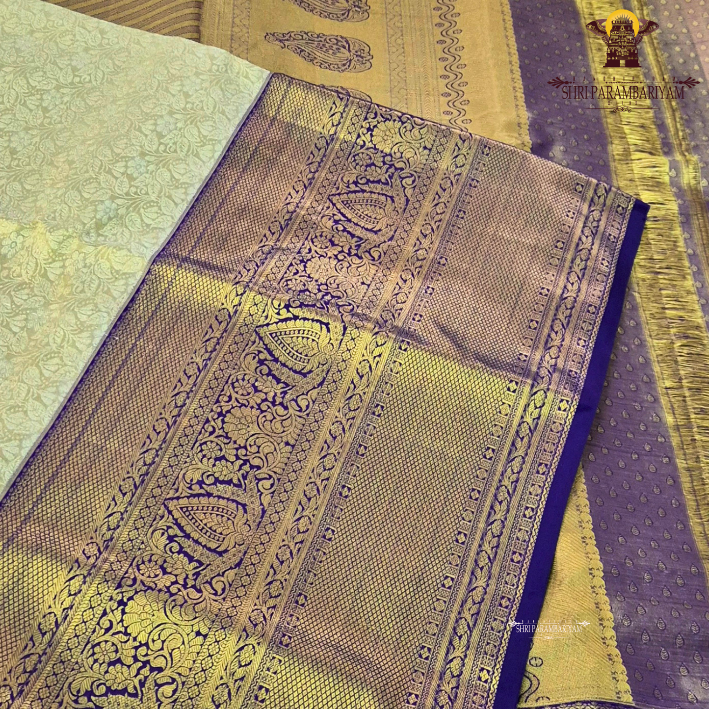 A regal combination of champagne gold and deep royal blue Saree