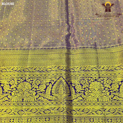 A regal combination of champagne gold and deep royal blue Saree