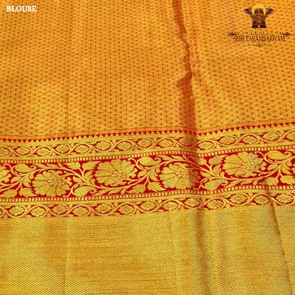 A vibrant combination of parrot green and rich gold Saree