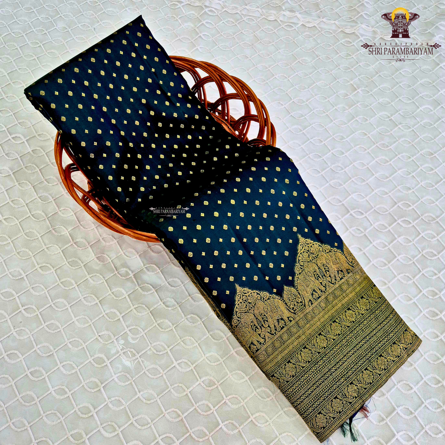 A classic Deep Green body adorned with finely woven gold zari Saree