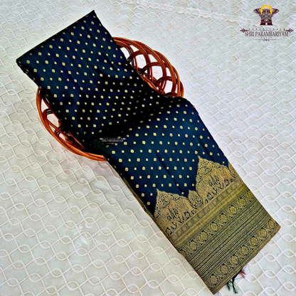 A classic Deep Green body adorned with finely woven gold zari Saree