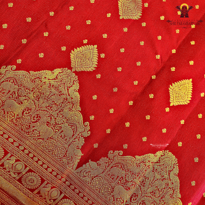 A rich Tomato Red / Vermilion Red body with elegant Golden Zari Saree