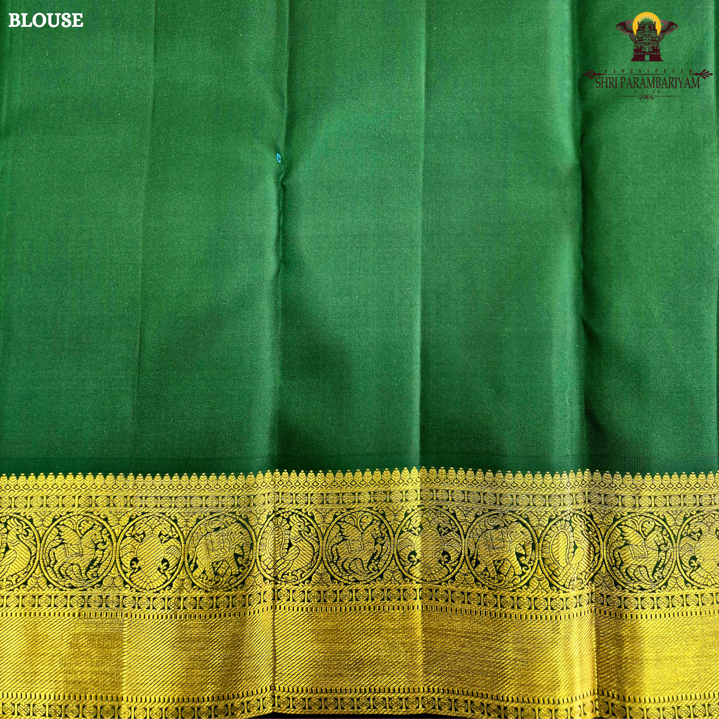 A vibrant mustard orange body highlighted with delicate zari buttas Saree