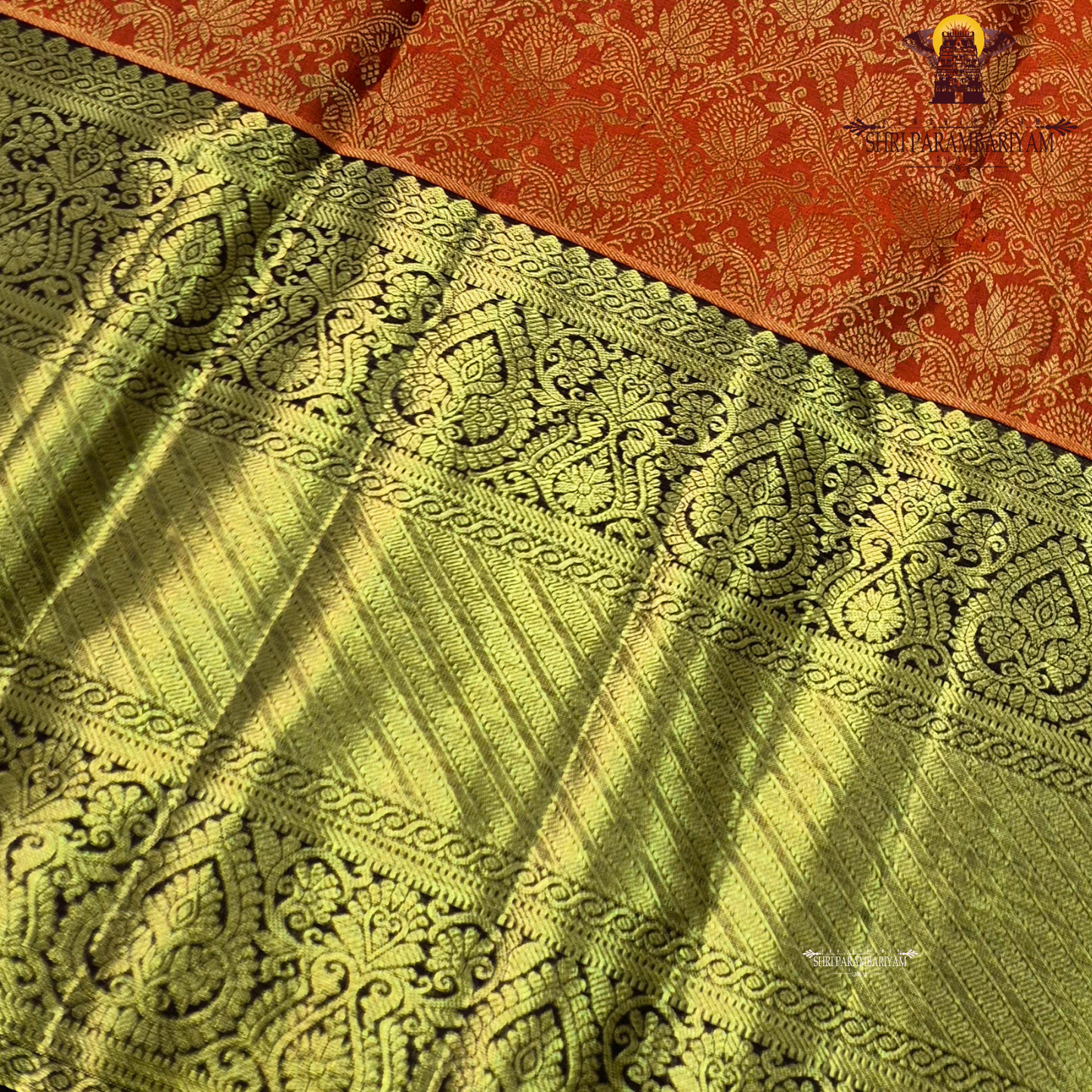 A bright orange with a rich coffee brown and gold korvai border Saree