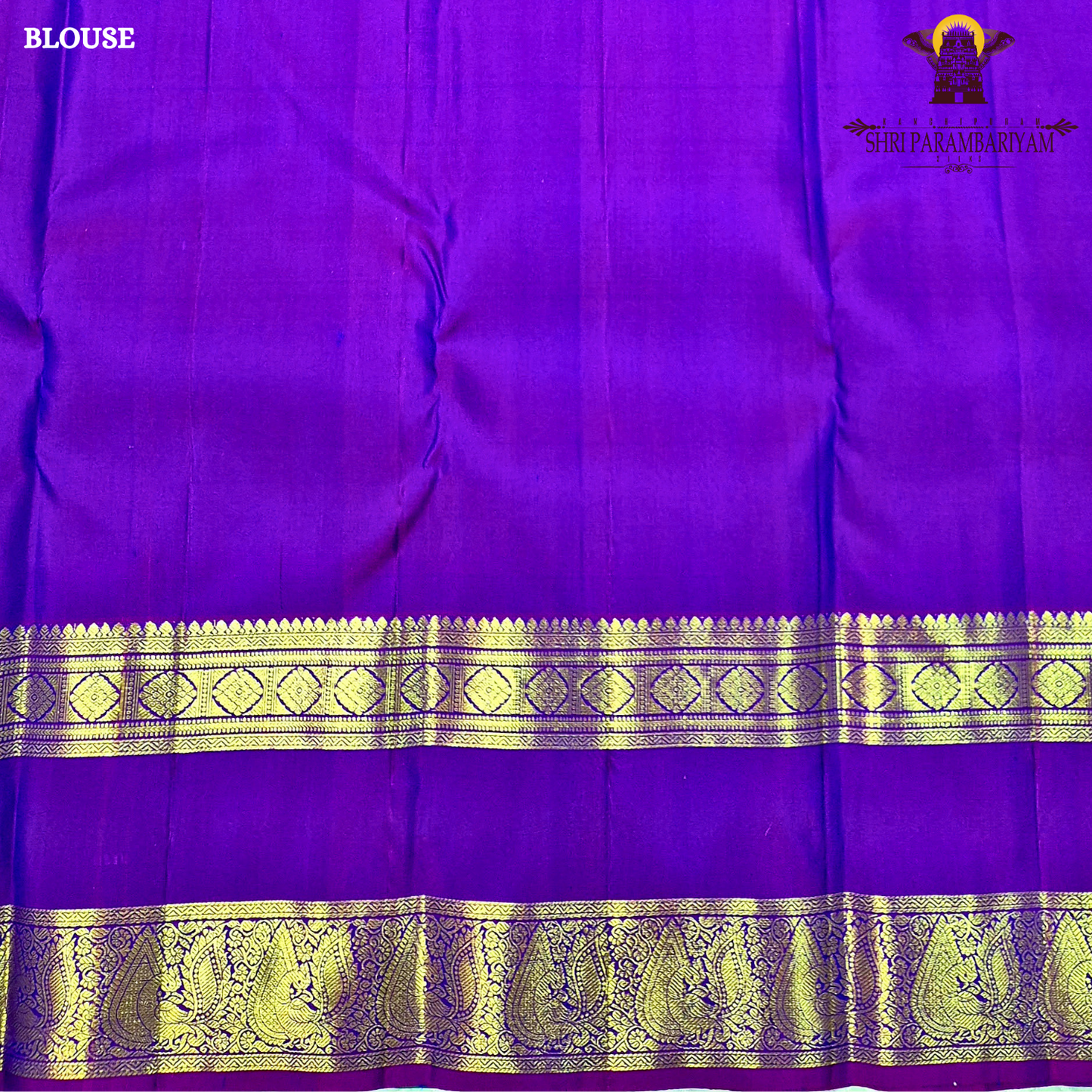 A elegant teal blue (peacock blue) body with a rich contrast purple/violet border Saree