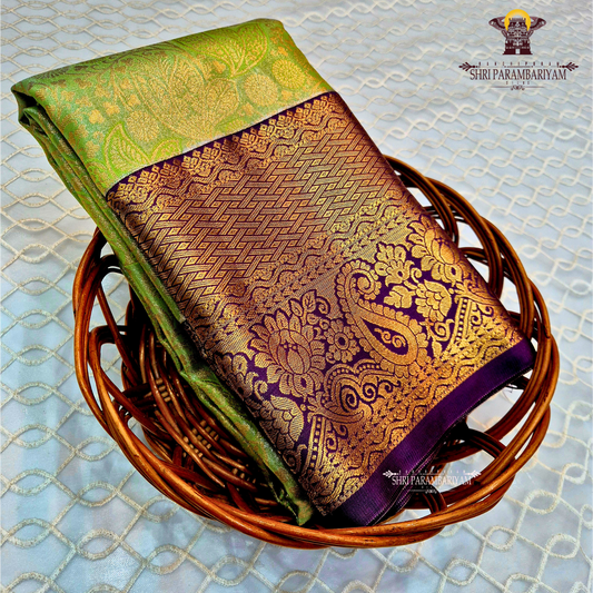 A refreshing parrot green / leaf green Tissue Saree