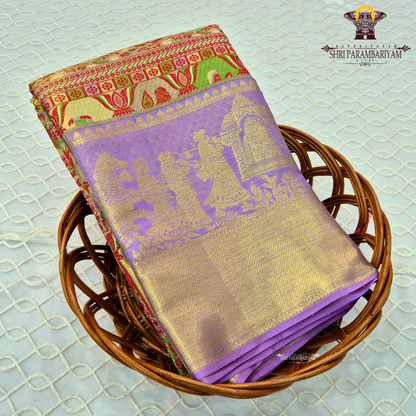 A charming lavender / lilac base paired with a rich golden zari pallu Saree